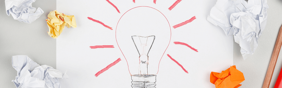 imagem com uma lâmpada desenhada em um papel- blog agência MAGNA