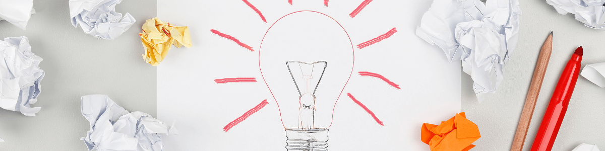 imagem com uma lâmpada desenhada em um papel- blog agência MAGNA